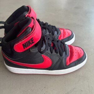 Boys black and red Nike high tops
